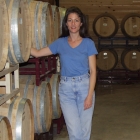 Jackie with wine barrels